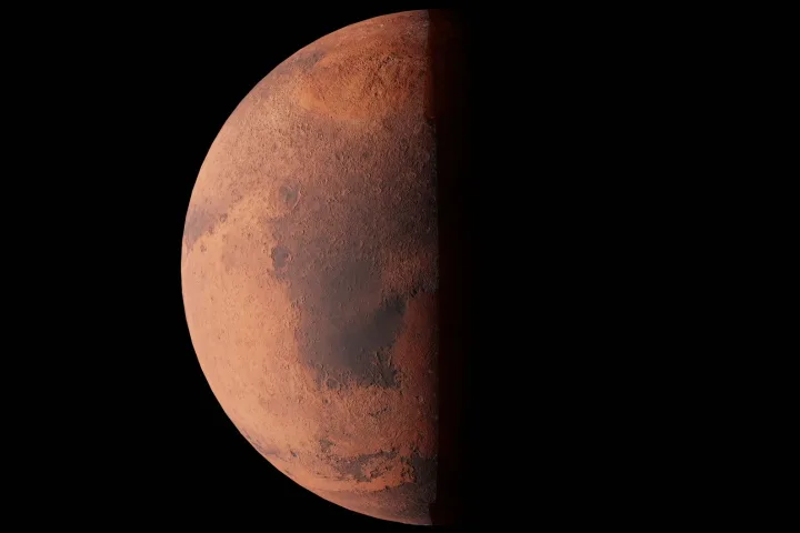 Tempesta di polvere che avvolge la superficie di Marte vista dallo spazio